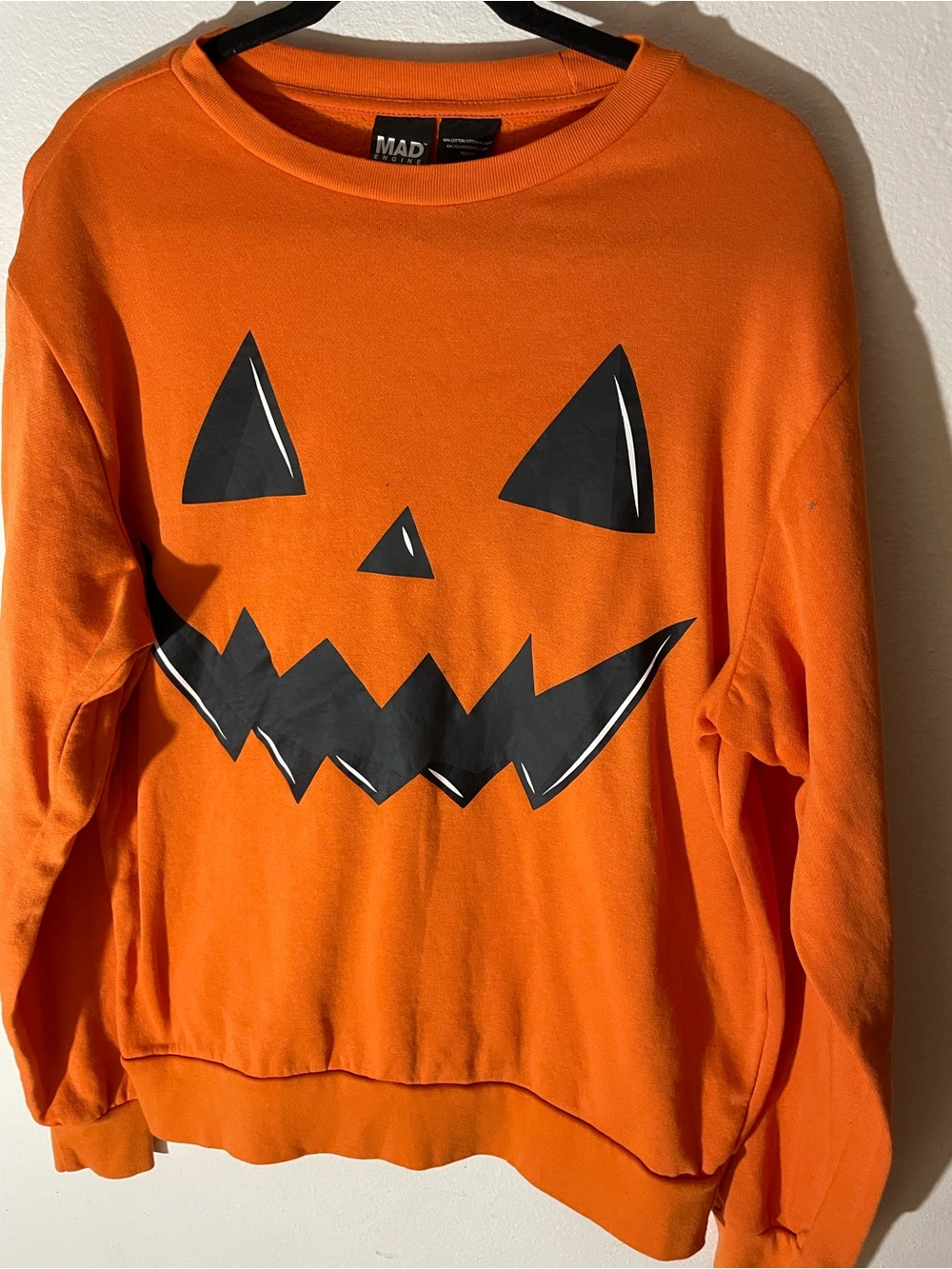 MAD Engine Orange Sweatshirt with Black Jack-O'-Lantern Face